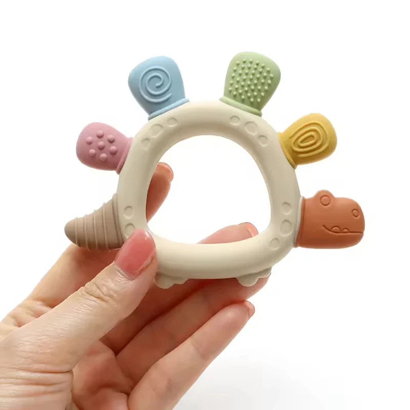 Baby Dinosaur Teether BPA-Free – Easy-Grip Gum Relief Toy - Image 4